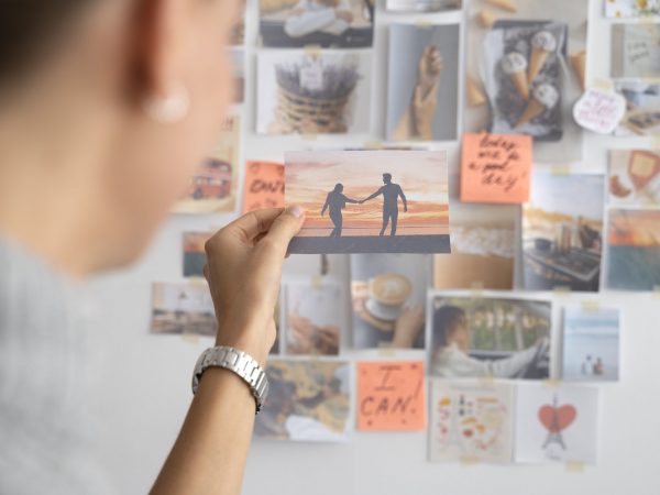 woman-creating-vision-board-side-view